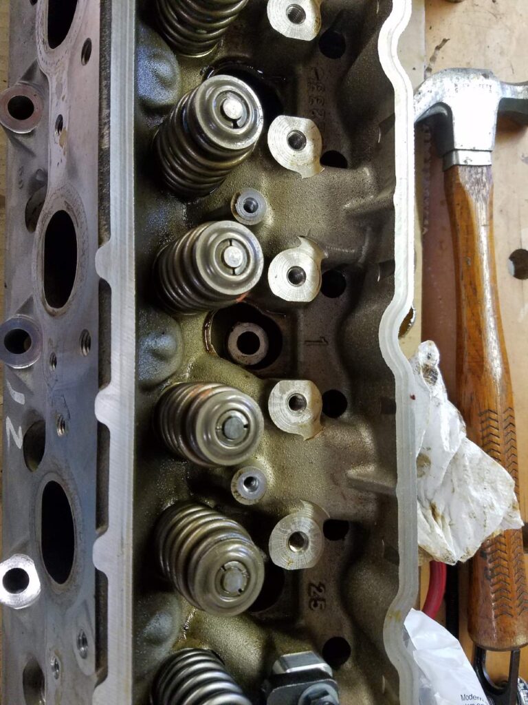 One cylinder head on bench