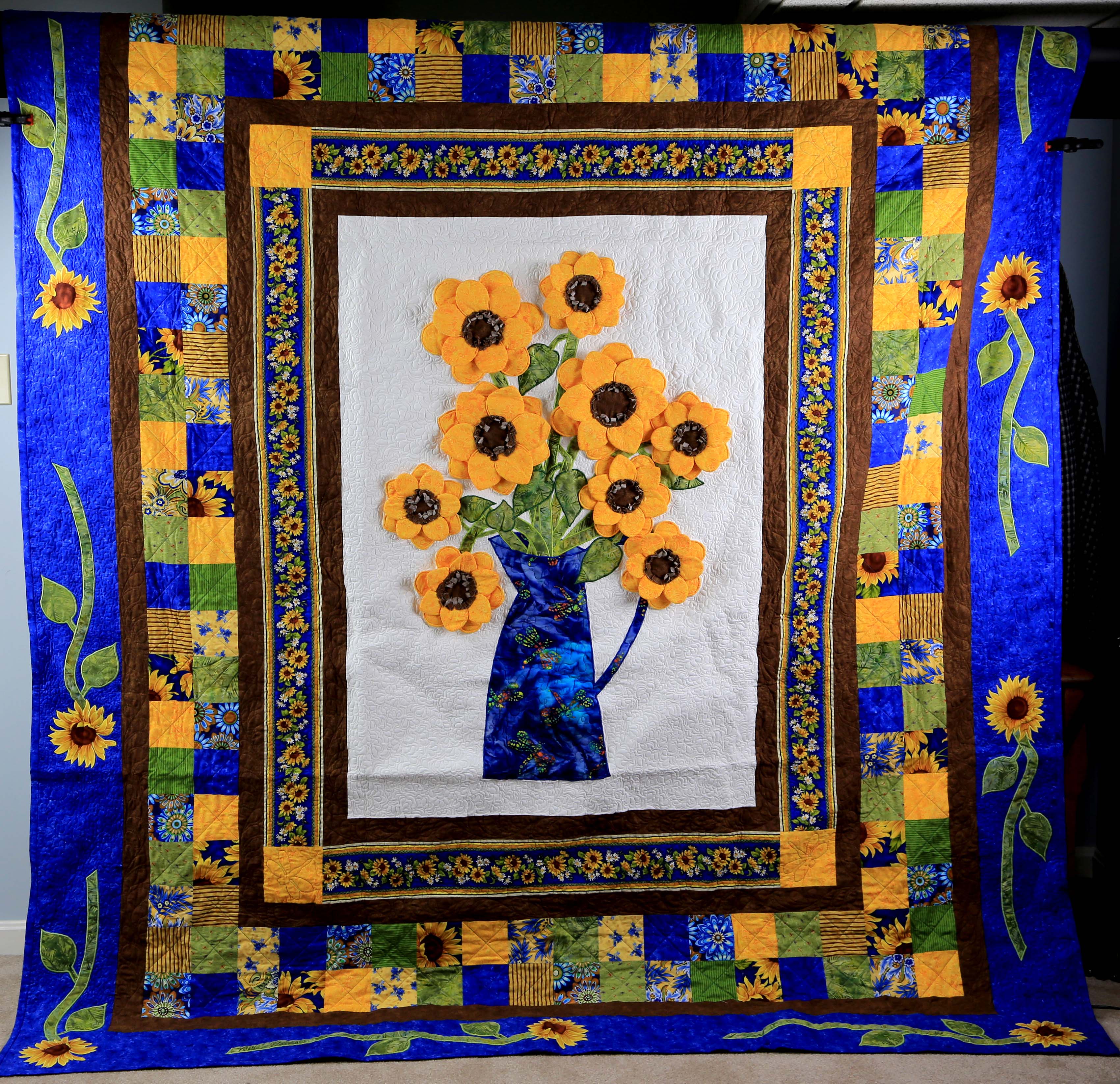 Shaking out the Sunflower Quilt