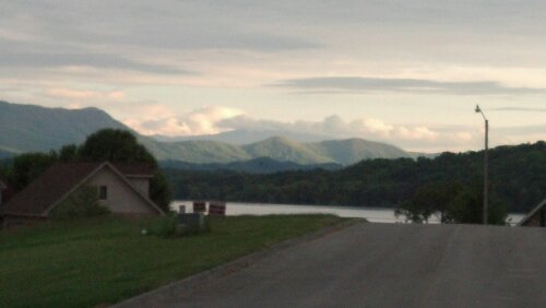 A view of the mountains across the lake in beautiful evening light